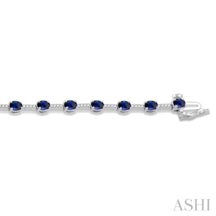 1/3 Ctw Round Cut Diamond & 4x3 MM Oval Cut Sapphire Precious Bracelet in 10K White Gold