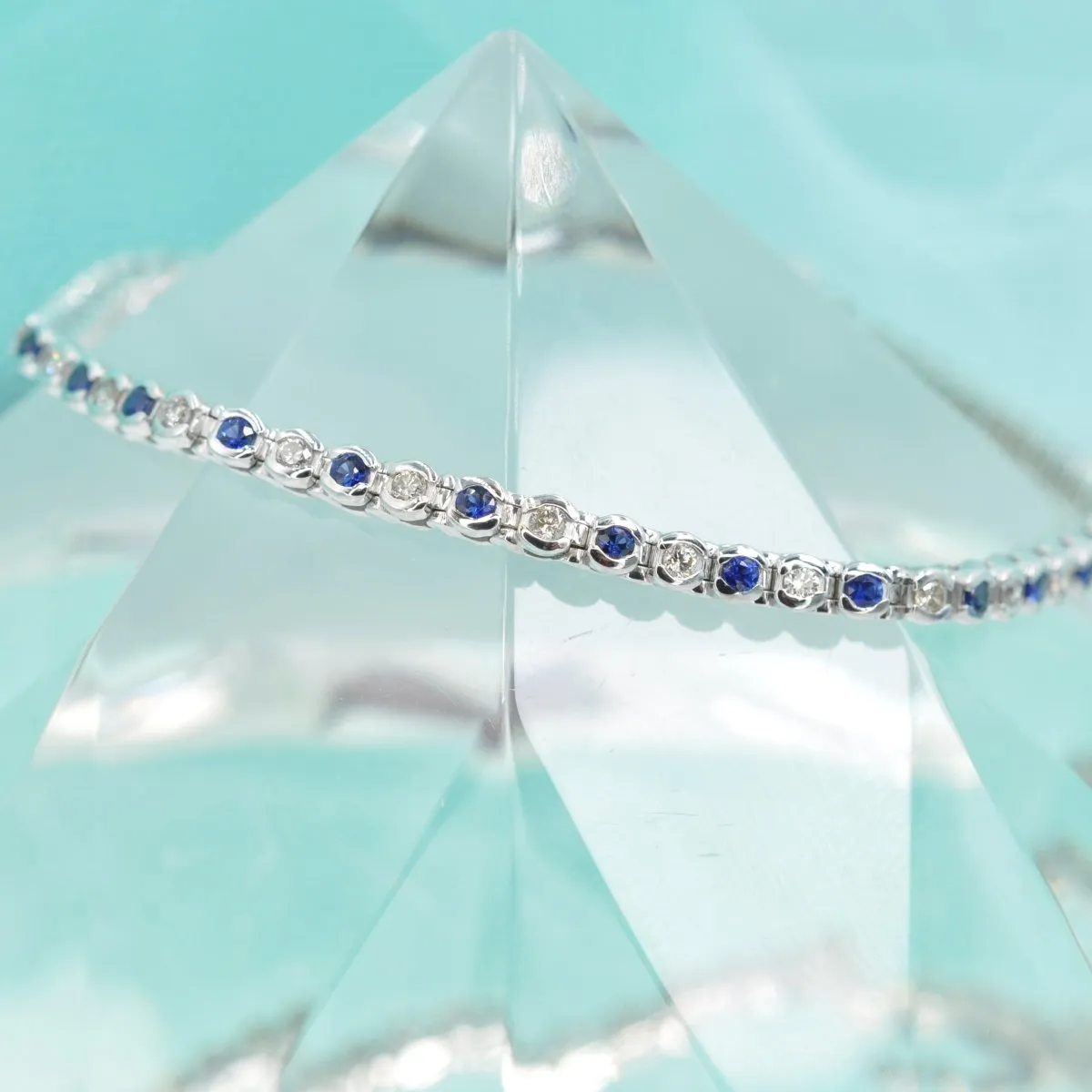 Enchanting 1.00 CT Round Cut Blue Sapphire and Diamond Color Stones Bracelet in 14KT White Gold