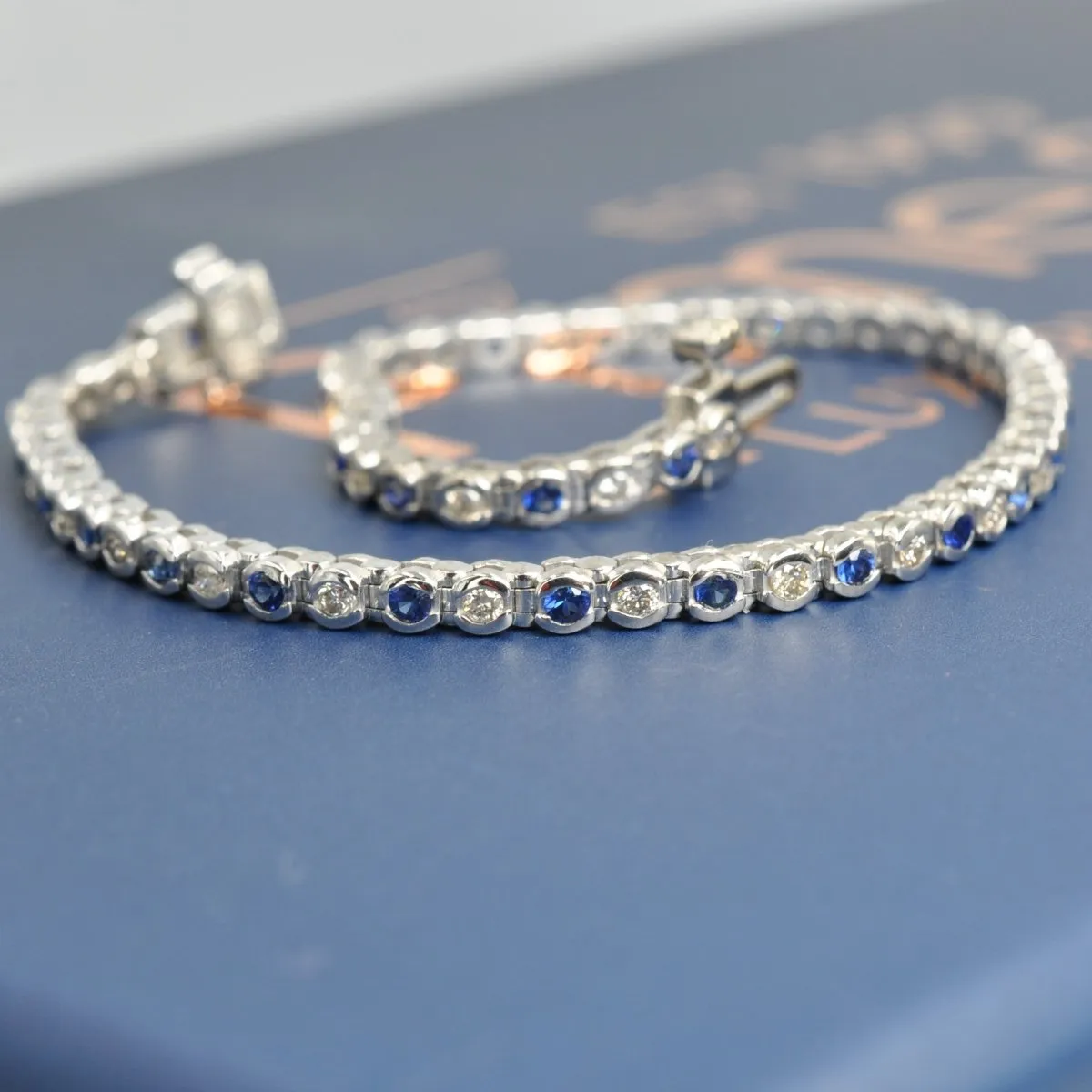 Enchanting 1.00 CT Round Cut Blue Sapphire and Diamond Color Stones Bracelet in 14KT White Gold