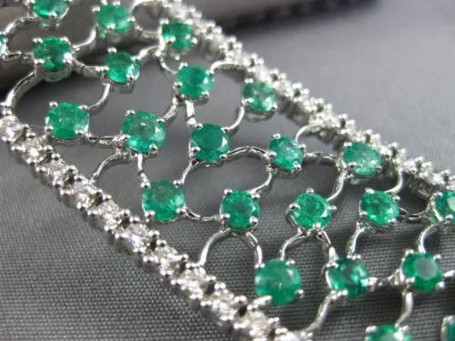 WIDE 15.0CT DIAMOND & COLOMBIAN EMERALD 18KT WHITE GOLD FILIGREE TENNIS BRACELET